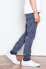 The Lou is a modernized take on the classic men's slim-straight jean – it has a comfortable rise with a slightly tapered regular leg. This uniform grey-blue fabric is unique and easy to wear. 