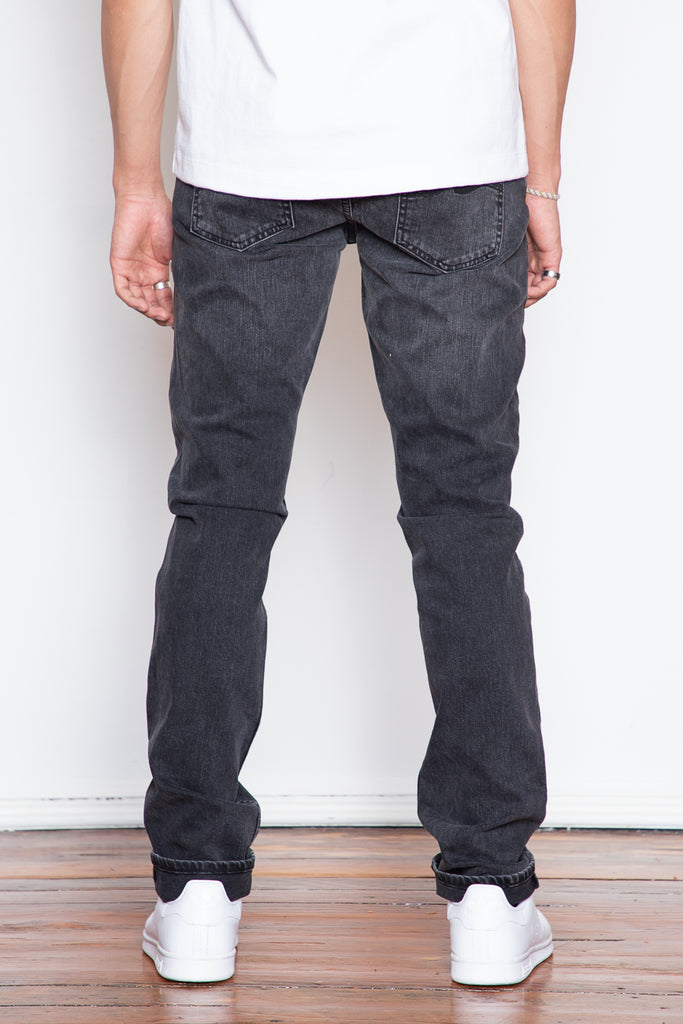 Nudie's Lean Dean fit has a true tapered leg with a comfortable rise. This washed black fabric is almost grey in some parts and feels truly worn in and vintage with beautiful fading details.