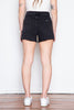 This high-rise denim short has a raw-cut hem for a vintage appearance. 