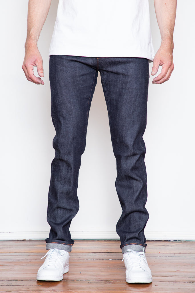 The Unbranded "UB222" is a great tapered fit. Roomy in the seat and thigh and tapered through the leg to a narrow leg opening. The 1% stretch in this jean offers an easier break in process and a bit more flexibility than a 100% cotton jean.