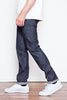 The Unbranded "UB222" is a great tapered fit. Roomy in the seat and thigh and tapered through the leg to a narrow leg opening. The 1% stretch in this jean offers an easier break in process and a bit more flexibility than a 100% cotton jean.