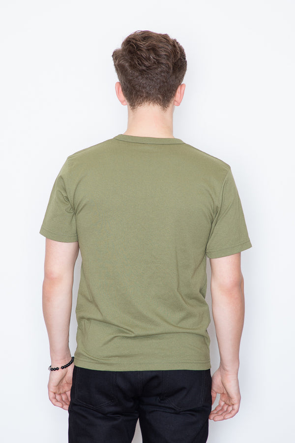 Meet your new favourite t-shirt. The muted green of this tee pairs really nicely with denim (and we would know!) This crewneck tee is inspired by vintage tees - expect a boxy, looser fit in the body. Recycled plastic bottles and recycled cotton give this t-shirt a soft feel.