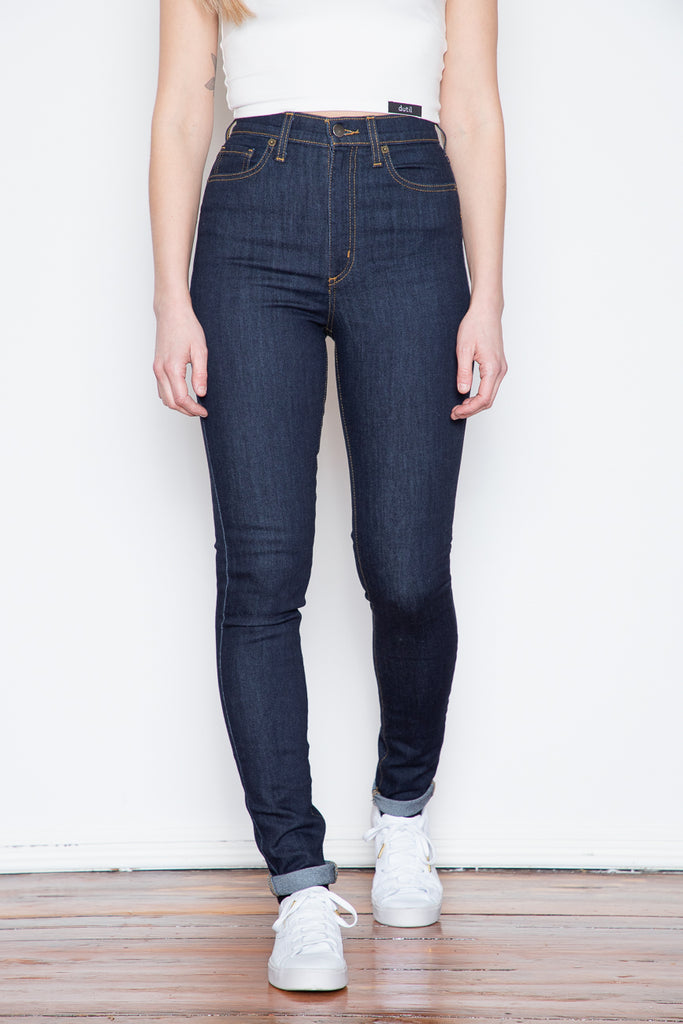 New to Dutil's Quintessential Series, this High Rise Skinny is made from a comfortable and sustainable washed, indigo-dyed fabric that is sleek and versatile. The fabric's 91% cotton composition means that this jean has a structured denim-y feel without sacrificing any comfort. The denim has been finished off in a high-rise, skinny cut that is flattering and timeless.